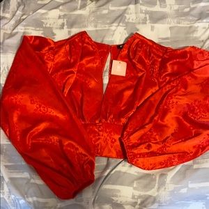 Red cropped puffer sleeve blouse